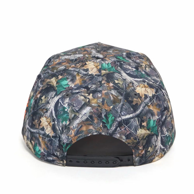 Woodlands L Hat back view — real tree camo snapback with black closure